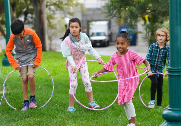 children playing on the grass